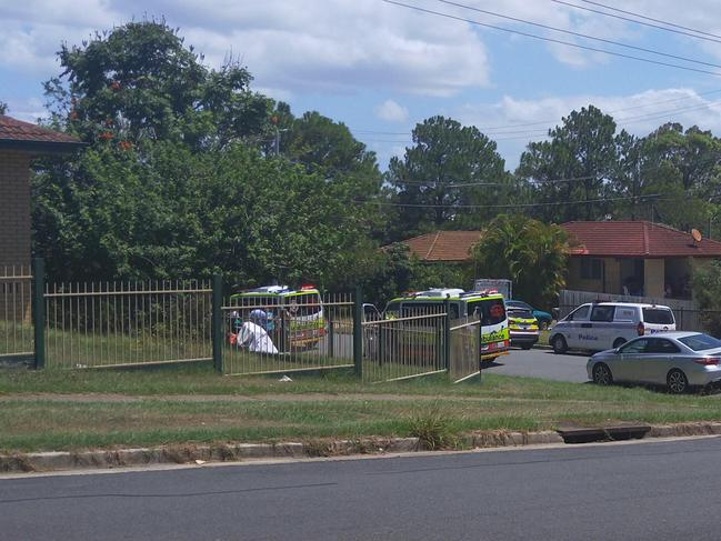 Police and paramedics on scene of dog bite at Labrador. Photo: Jerad Williams