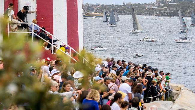 Members of the public at Hornby Lighthouse in Watsons Bay watching the start of the race.