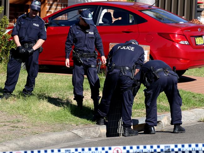 Officers continued to scour the area for evidence yesterday. Picture: Chris Pavlich