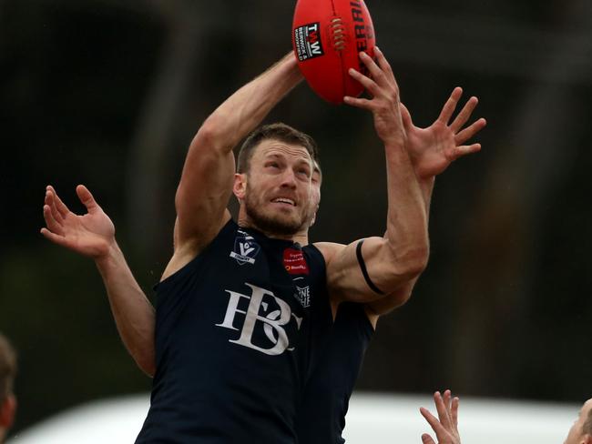 AFL Outer East (Premier): Woori Yallock v Berwick.5 Travis Tuck takes a strong mark for  Berwick.Picture: Stuart Milligan