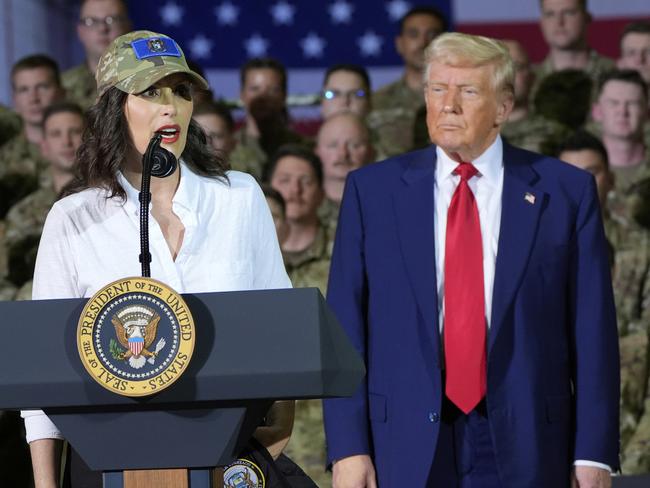 US President Donald Trump listens as Michigan Governor Gretchen Whitmer speaks to members of the Michigan National Guard at Selfridge Air National Guard Base. Picture: AP Photo/Alex Brandon