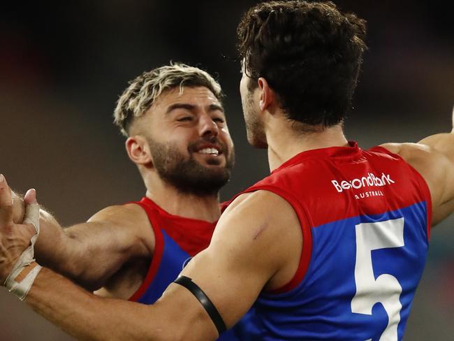 MELBOURNE, AUSTRALIA - JUNE 26: Christian Petracca of the Demons celebrates a goal  during the round 15 AFL match between the Essendon Bombers and the Melbourne Demons at Melbourne Cricket Ground on June 26, 2021 in Melbourne, Australia. (Photo by Darrian Traynor/AFL Photos/via Getty Images )