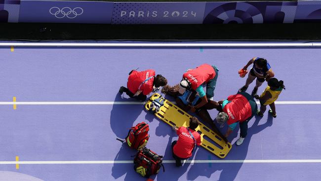 She was put on a stretcher. Photo by Richard Heathcote/Getty Images.