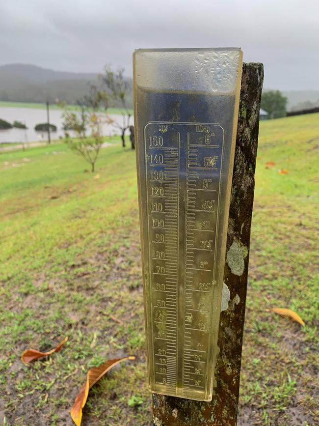 An overflowing rain gauge on a farm at Genoa in far East Gippsland. Picture: Supplied