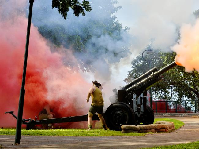 A gun is fired during a re-enactment at 75th Bombing of Darwin Memorial Service on the Esplanade. PICTURE: Elise Derwin