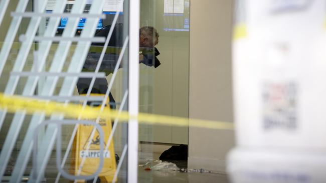 Crime scene investigators at the Altitude Apartment building after the stabbing. Picture: Emma Brasier