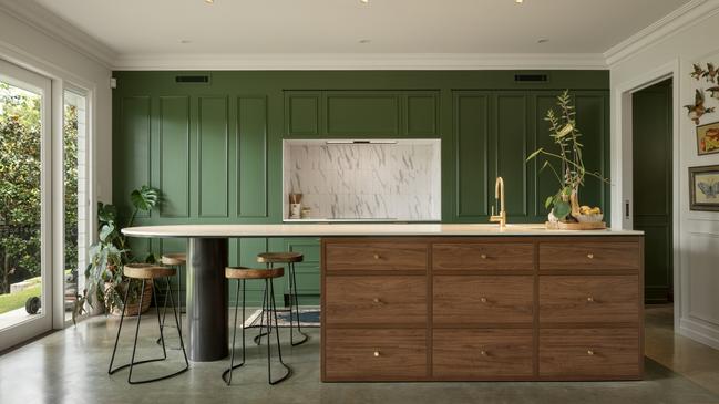 Striking green cabinetry was used throughout.