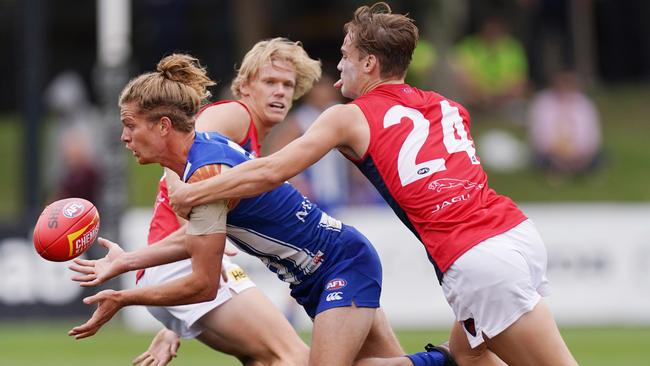 Trent Rivers lays a tackle on Jed Anderson. Picture: AAP Image/Michael Dodge