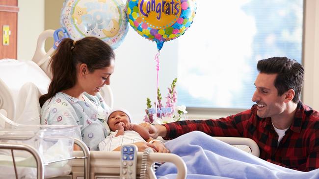 Generic photo to illustrate health insurance  ..  young family pictured in a hospital room.   Picture: iStock