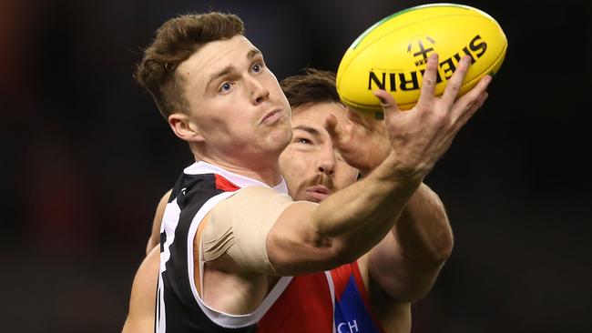 Blake Acres marks in front of Michael Hibberd. Picture: Michael Klein