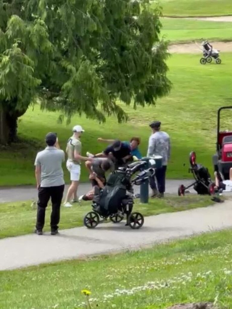 One golfer threw a wild kick during the brawl.