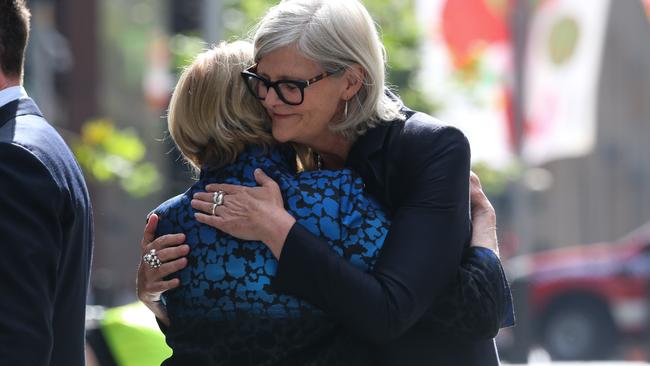 Governor-General Sam Mostyn hugs Jane Dawson, the mother of siege victim Katrina. Picture: Gaye Gerard