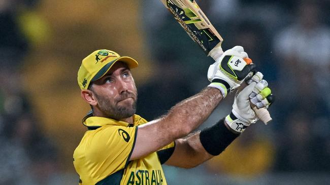 Australia's Glenn Maxwell plays a shot during the 2023 ICC Men's Cricket World Cup one-day international (ODI) match between Australia and Afghanistan at the Wankhede Stadium in Mumbai on November 7, 2023. (Photo by INDRANIL MUKHERJEE / AFP) / -- IMAGE RESTRICTED TO EDITORIAL USE - STRICTLY NO COMMERCIAL USE --