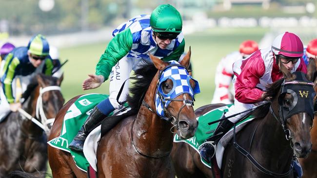 John Allen lifts Fifty Stars to victory in the Australian Cup. Picture: AAP