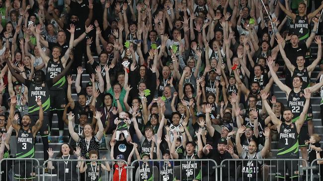 Phoenix players with fans after the derby. Picture: Daniel Pockett/Getty