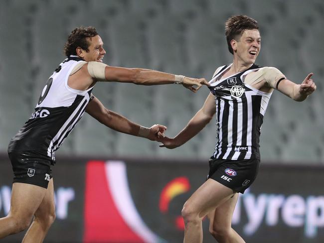 AFL - SHOWDOWN 48 - Port Adelaide v Adelaide Crows at the Adelaide Oval. Zak Butters celebrates his goal with some flair with Steven Motlop Picture SARAH REED