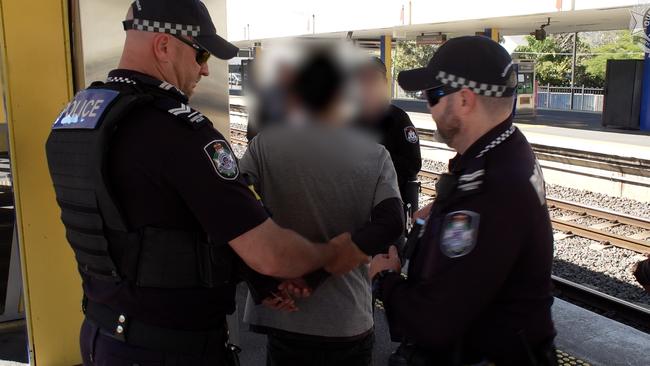 An arrest made as part of Operation Whiskey Legion in North Brisbane. Photo: QPS.