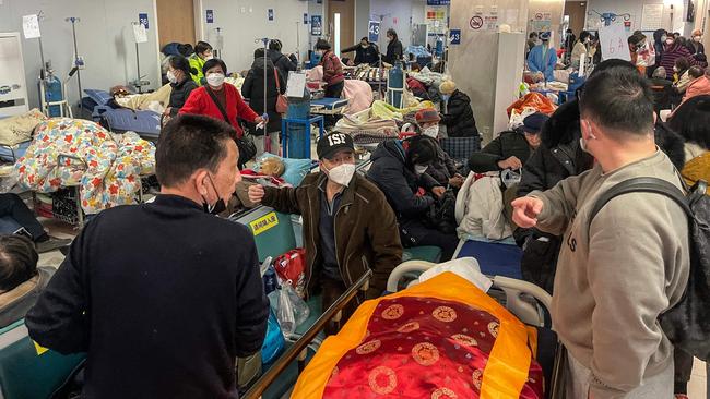 Patients on stretchers at Tongren hospital in Shanghai on Tuesday. Picture: AFP