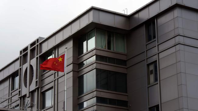 The Chinese flag at mast outside of the Chinese consulate in Houston on Wednesday. Picture: AFP