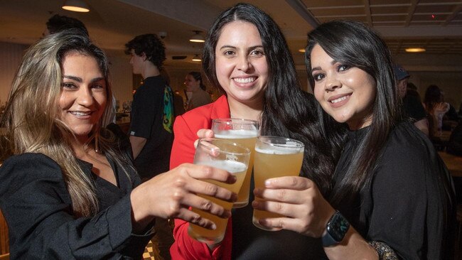 Here’s cheers NSW! Dani Barona (left), Angela Osorio (centre) and Kate Alfonso enjoy catch-up drinks at The Clock in Surry Hills. Picture: Julian Andrews