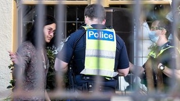 Melbourne musician Alejandro Adams confronted by police in his St Kilda home on Saturday. Pic: Jacqueline Walker