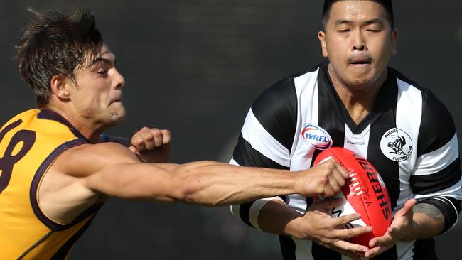 Corey Salvador (left) kicked nine goals for Yarraville-Seddon on Saturday.