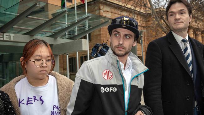 Melanie Nguyen and Glenn Davies, the parents of 17-month-old Ronan Davies, leave Adelaide Magistrates Court. Picture: NCA NewsWire Emma Brasier