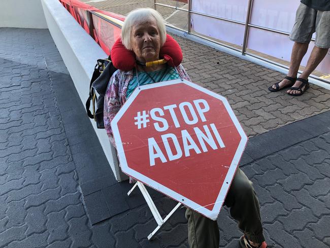 Barb Nielsen, 75, locked herself to a handrail by her neck outside  of the Adani headquarters in Townsville.