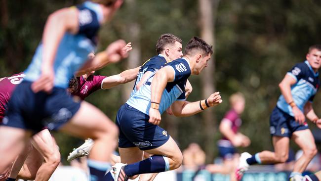 Action in the U19 match between the young Waratahs and Reds. Pic: Kev Nagle.