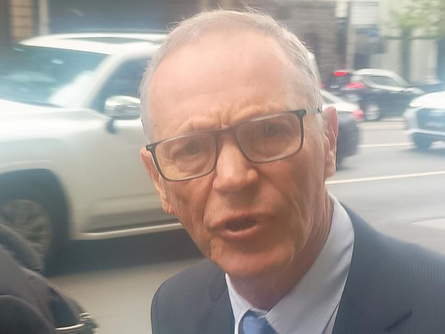 Former professor of neurosurgery Andrew Kaye, 74, leaves the Victorian Civil and Administrative Tribunal, where he has been accused of making an inappropriate sexual advance against a young female doctor.