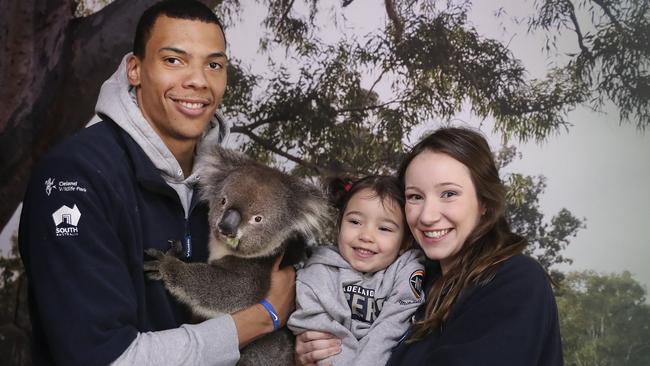 Jacob Wiley with family at Cleland Wildlife park — wife Brittany and two-year-old daughter Aliya. Picture: Sarah Reed.