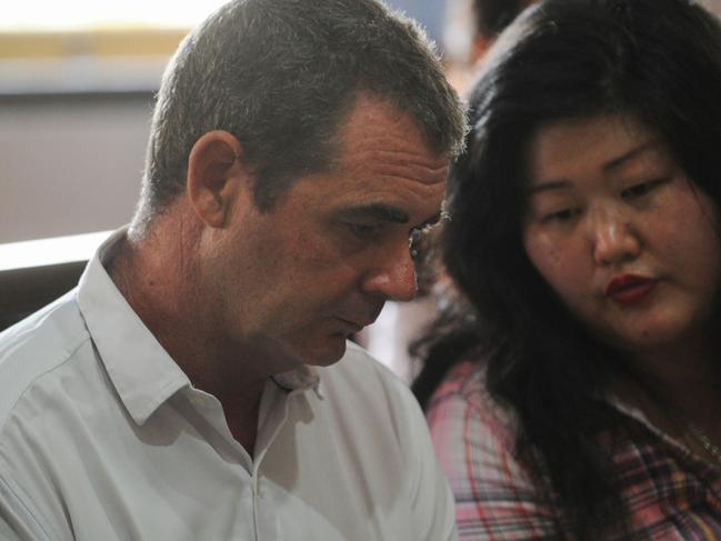 Australian national Brendon Luke Johnsson (L), 43, who was arrested for narcotics possession, speaks to his interpreter at court in Denpasar on Indonesia's Bali island on Fenbruary 6, 2019. - Prosecutors are recommending an eight-year prison sentence for Johnsson, who was arrested in August 2018 for allegedly possessing 12 grams of cocaine. (Photo by SONNY TUMBELAKA / AFP)