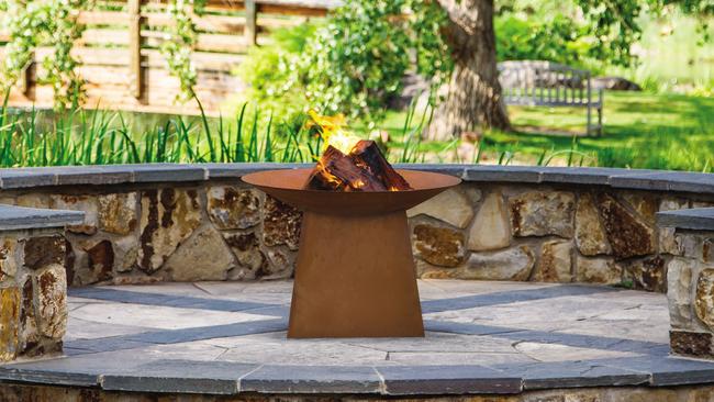 The Aurora rustic firepit from Bunnings makes an obvious centrepiece in winter.