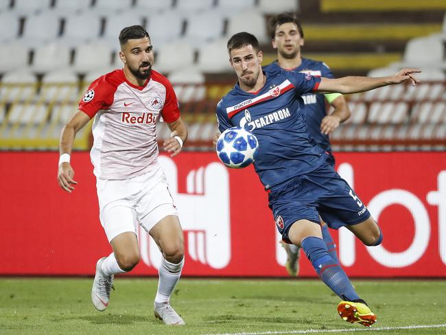 Milos Degenek (R) in action for Red Star Belgrade during the UEFA Champions League Play Off First Leg match between FK Crvema Zvezda and FC Red Bull Salzburg. Picture: Getty Images