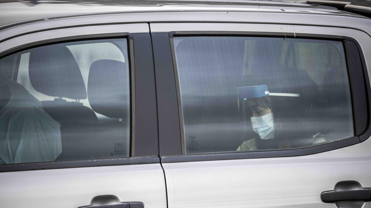 Sarah Caisip leaves after viewing her father’s body. Photo: Glenn Hunt / The Australian