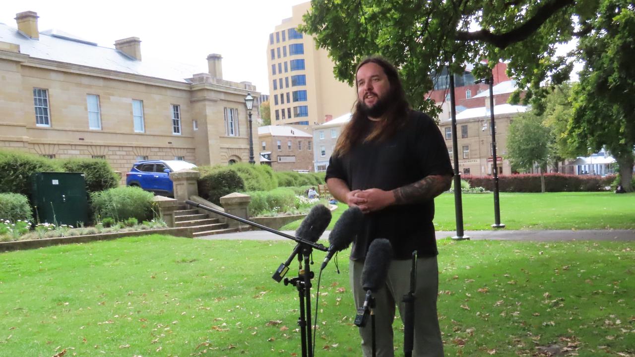 Bob Brown Foundation Marine Campaigner Alistair Allan speaks to the media on parliament Lawns in Hobart on Thursday, March 6, 2025.