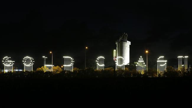 The Gold Coast sign in lights pictured on the M1. (AAP Image/Josh Woning)