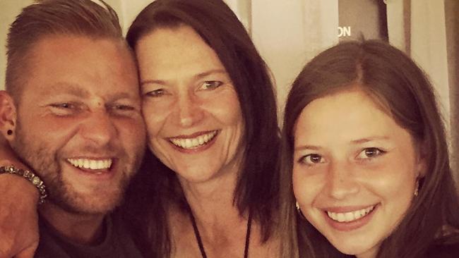 Kerrie VanTijn (centre) with her children, Lauren and Josh.