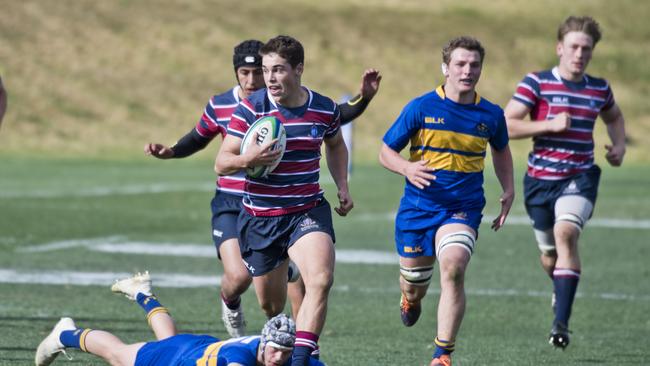 TSS halfback Hudson Meyer en route to the tryline against Toowoomba Grammar School.