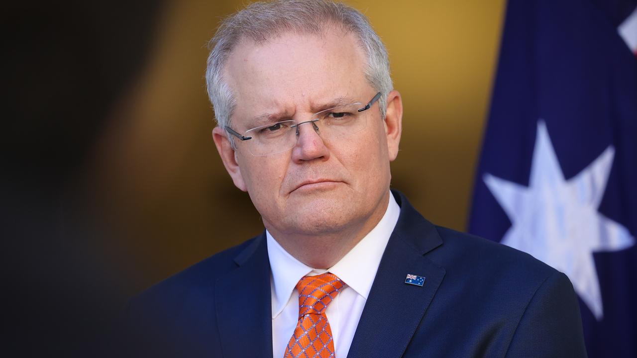 Prime Minister Scott Morrison said flights into Australia will be cut by half. Picture: David Gray/Getty Images.