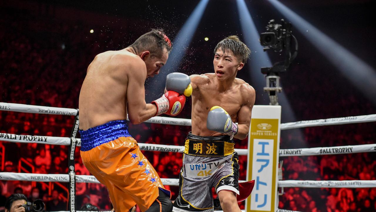 Naoya Inoue of Japan (R) and Nonito Donaire of Philippines fight in their World Boxing Super Series bantamweight final.