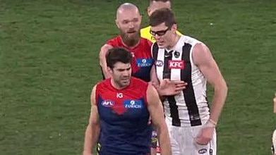 Christian Petrecca and Mason Cox clash after the siren on King's Birthday at the MCG. Picture: Channel 7