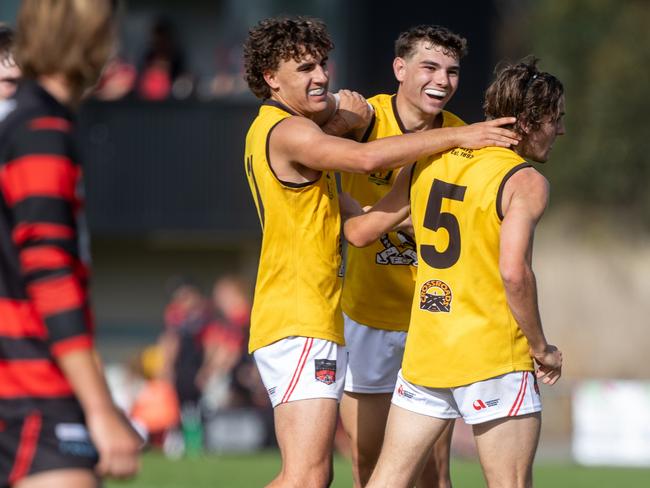 North Launceston forward Brandon Leary is congratulated after kicking a goal. Picture Linda Higginson/Solstice Digital