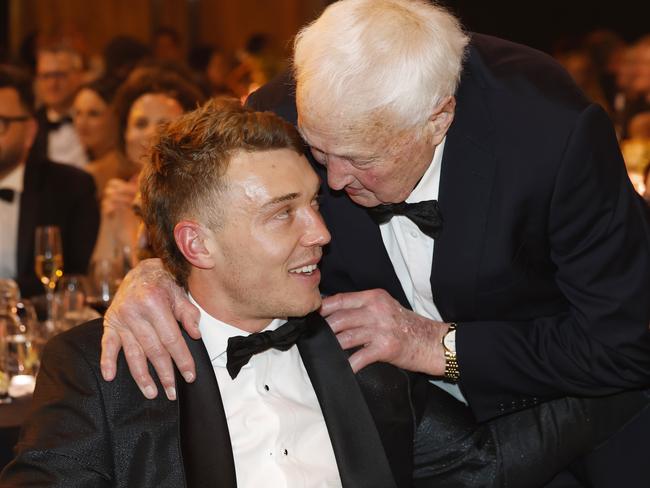 NCA. MELBOURNE, AUSTRALIA. September 23 , 2024.  The 2024 AFL Brownlow medal at the Palladium room in Crown Casino, Melbourne.   Patrick Cripps of the Blues is congratulated by Carlton legend John Nicholls  after winning the 2024 Brownlow Medal .       .  Pic:Michael Klein