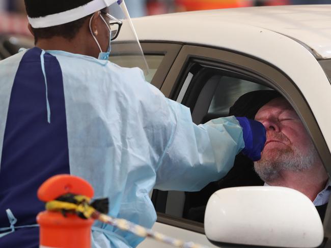 MELBOURNE, AUSTRALIA - NewsWire Photos. MAY 25, 2021: A man (who gave permission to be photographed) gets COVID-19 testing at the Melbourne Showgrounds in Flemington. Picture: NCA NewsWire / David Crosling