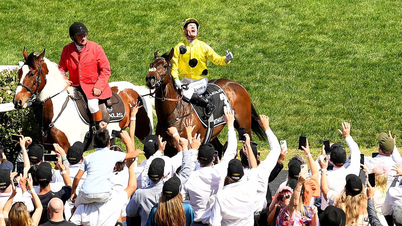 Mark Zahra riding Without A Fight after winning the 2024 Melbourne Cup.