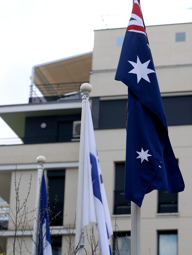 Unity ... The Australian, EU and French flags flying at the DCNS headquarters in Paris. Picture: Calum Robertson