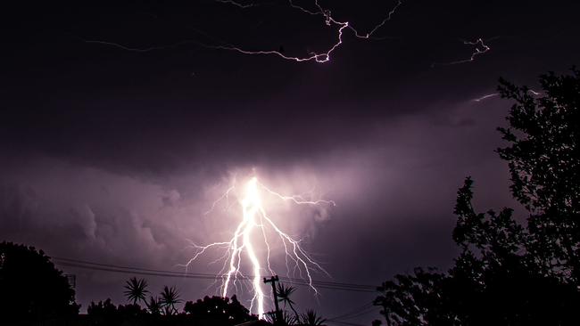 Photographer Phil Johnson captured these images of lightning over Burnside on the Sunshine Coast during the storms.