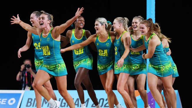 Team Australia celebrate victory during the Netball Gold Medal match between Team Jamaica and Team Australia. Picture: Stephen Pond/Getty Images