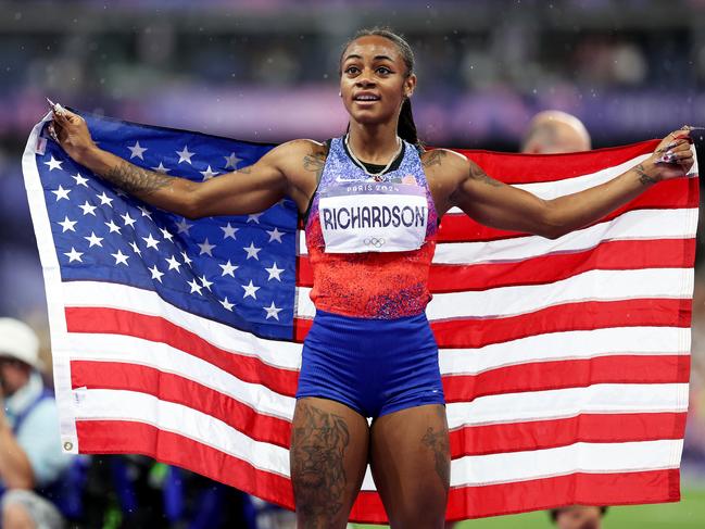 PARIS, FRANCE - AUGUST 03: Sha'Carri Richardson of Team United States celebrates winning the silver medal after competing the Women's 100m Final on day eight of the Olympic Games Paris 2024 at Stade de France on August 03, 2024 in Paris, France. (Photo by Hannah Peters/Getty Images)